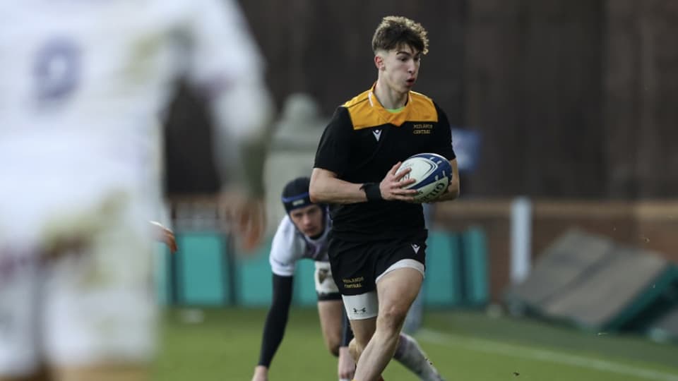 Loughborough student Daniel Barnett playing rugby.